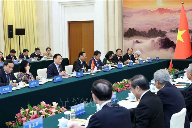 Chủ tịch Quốc hội Vương Đình Huệ hội kiến Chủ tịch Chính hiệp toàn quốc Trung Quốc Vương Hộ Ninh