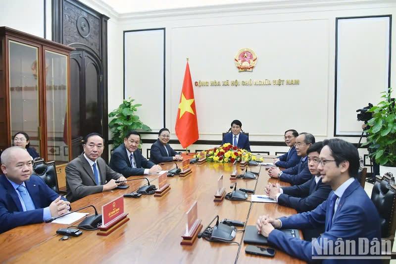 Việt Nam-Lào quyết tâm chung sức, đồng lòng, kề vai sát cánh