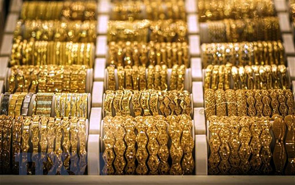 Giá vàng thế giới rời khỏi mức kỷ lục do đồng USD mạnh lên