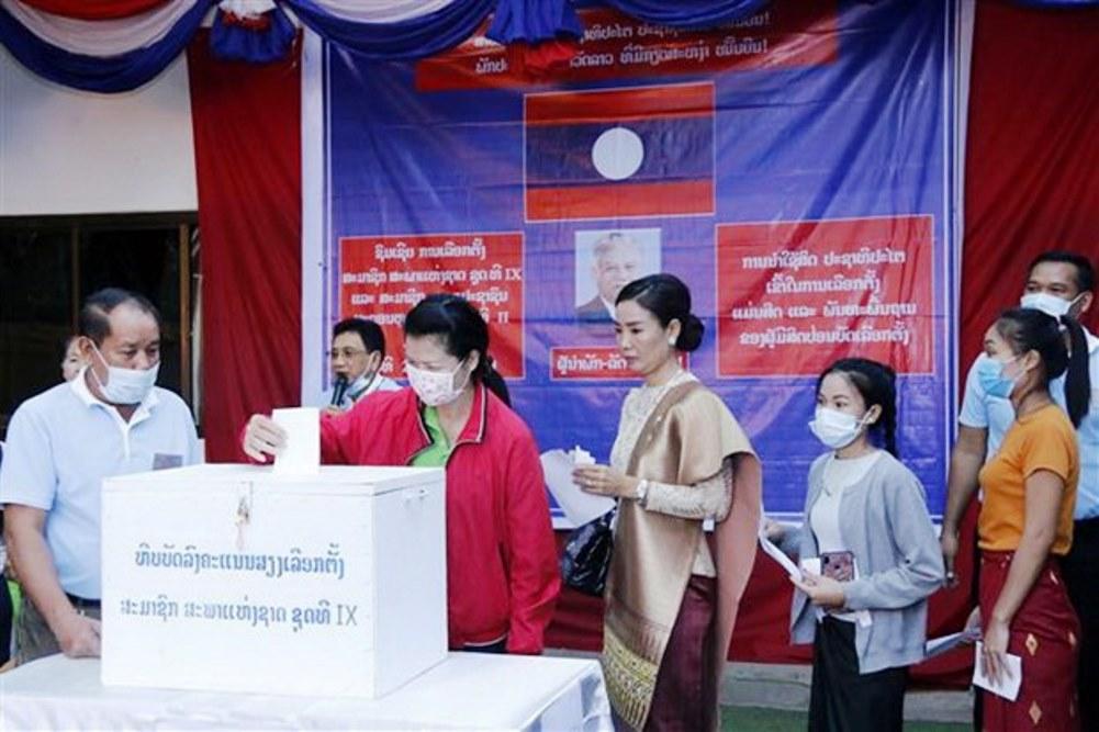 Người dân Lào đi bỏ phiếu bầu đại biểu Quốc hội khóa IX