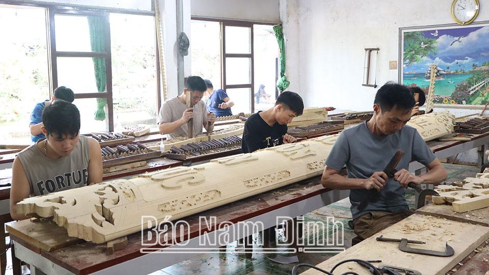 Đào tạo nghề gắn vớigiải quyết việc làm cho nông dân