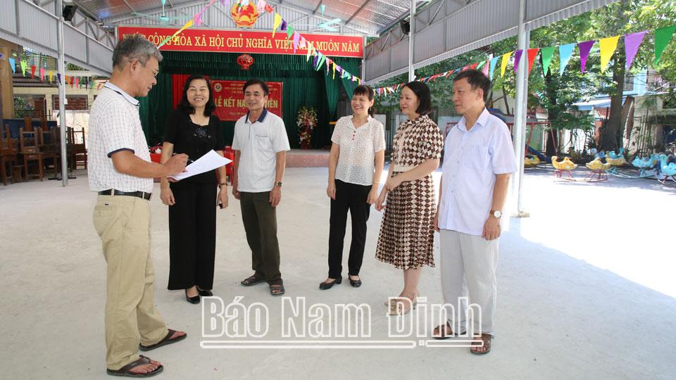 Phân công đảng viên phụ tráchnhóm hộ gia đình ở phường Vị Xuyên